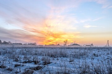 Dawn is in the sky over the village