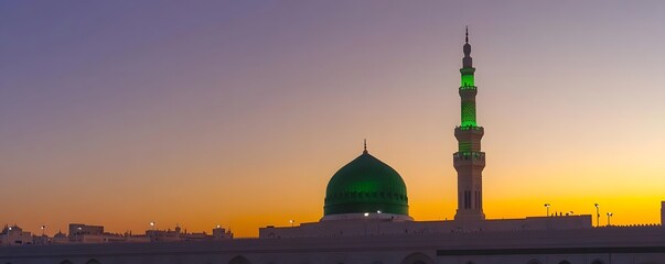 Fototapeta premium Prophet s mosque in medina illuminated at dusk or dawn
