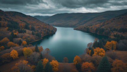 captured from a high viewpoint of a charming lake encircled by hills in autumn beneath a cloudy sky