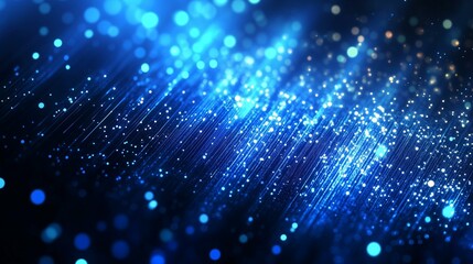 A mesmerizing blue abstract background with glowing particles and light streaks creating a futuristic and magical atmosphere