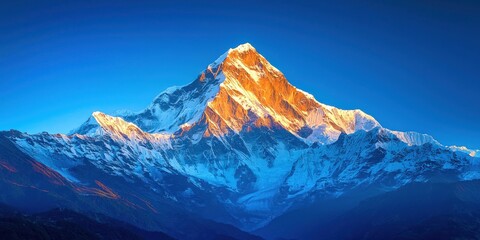 Mountain with snow on it and a blue sky in the background