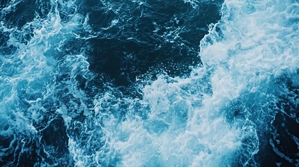 Fototapeta premium Serene blue ocean waves under a bright sun, high-contrast water surface, tranquil seascape with natural beauty.