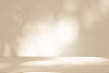 Wall interior background, studio and backdrops show products. with leaf shadow from window color beige and white. background for text insertion and presentation of product	