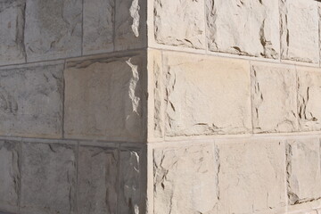 Stone wall corner. Light on one side, shadow on the other side.