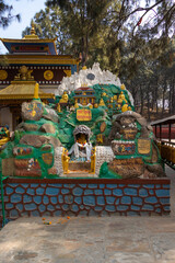 Tare Gumba located behind the golden statues of buddha at Swayambhunath, Kathmandu, Nepal