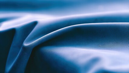 Captivating Blue Textile Texture with Abstract Folds and Woven Pattern