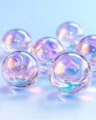 Iridescent spheres on blue background; science concept