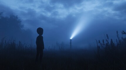 Mysterious Child in Foggy Field at Night Watching a Flashlight Beam