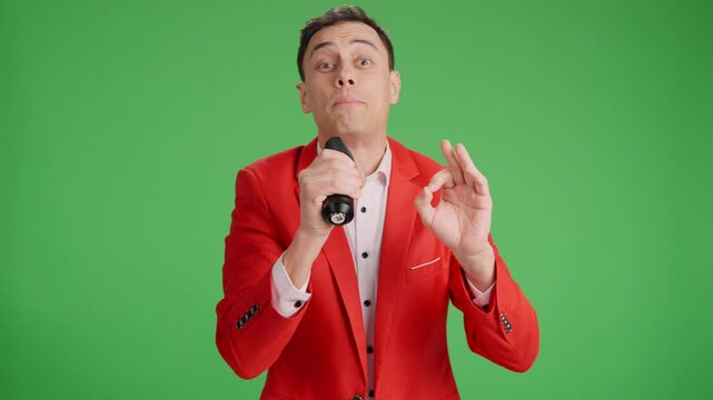 Enthusiastic showman introducing performer on green screen