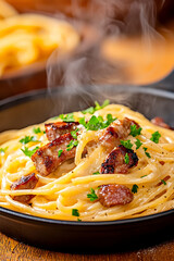 Fototapeta premium Steaming Carbonara pasta dish, close-up