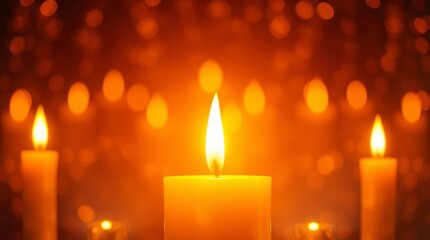 Burning candles glow with a warm, romantic light in the dark night, their flames creating a cozy and celebratory atmosphere