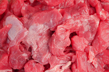 Fresh raw beef cuts displayed at a local market
