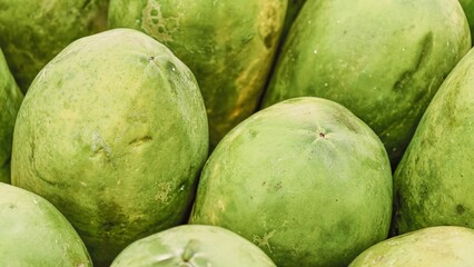 Abundance of Green Papayas, A Tropical Fruit Harvest Display, Fresh Produce