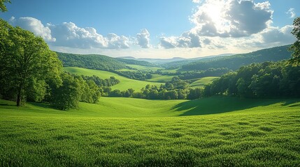 Fototapeta premium A picturesque green valley landscape unfolds, with lush fields stretching towards the horizon under a vibrant blue sky