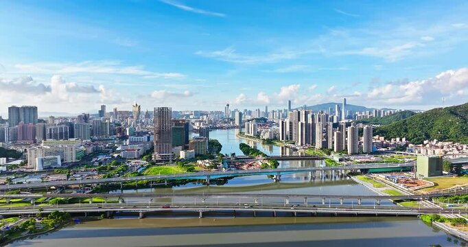 Aerial view of Zhuhai and Macau city skyline with modern buildings scenery, China. Zhuhai and Macau are two cities separated by only a river. 