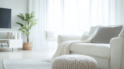 Bright white living room interior design with cozy sofa and knitted pouf home airy calm decor style
