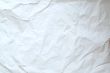 Obraz premium White Crumpled Paper Texture Background for Creative Design and Artistic Projects