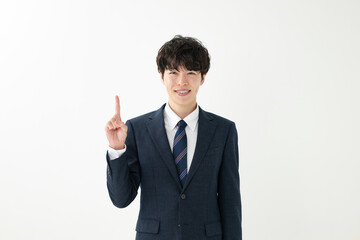 指差しするビジネスマン