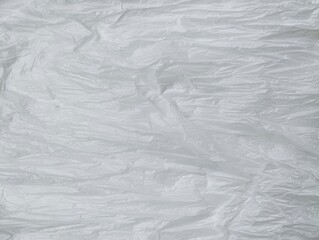 Abstrack white crumpled plastic bag texture background 