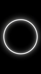A glowing circular neon frame on a dark background.