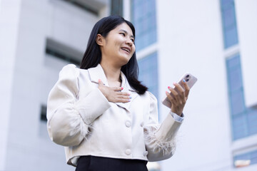 Future remote work combines technology smart phone connection online white digital business woman...