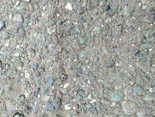Texture of closeup gravel showcases intricate
beauty, suitable for background designs,
nature themed projects, and texture inspiration in
various creative works.