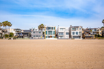 Hermosa Beach, California - Daytime, sunny beach front homes, walkways, neighborhoods, real estate in the South Bay with blue skies and clear views 