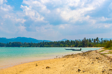 Pakarang Cape tropical beach landscape with boat Khao Lak Thailand.
