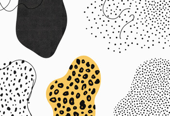 various shapes and designs, including a large black shape, a yellow shape with black spots, and a pattern of small black dots.