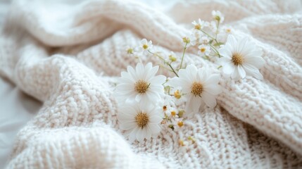 Soft Cream Knit Blanket with White Daisies and Delicate Flowers on Cozy Bedroom Surface