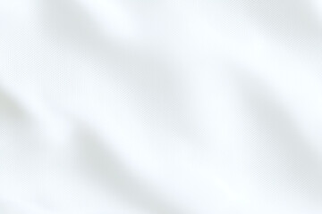Fototapeta premium Soft white fabric with smooth, flowing texture, ideal for backgrounds or textile designs. gentle waves create serene and elegant atmosphere