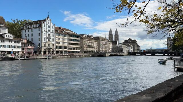 Zurich, Switzerland, Z&uuml;rich historic city center with Grossm&uuml;nster towers in the backgroud, Limmat river, Grossmunster is a Romanesque-style Protestant church in Z&uuml;rich, Switzerland