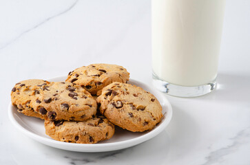 International Cookie Day. World Diabetes Day. National Real Sugar Day. World Heart Day. Breakfast with cookies and milk on the table