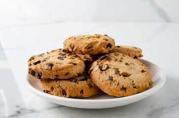 International Cookie Day. World Diabetes Day. National Real Sugar Day. World Heart Day. Breakfast with cookies and milk on the table