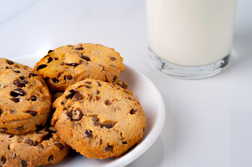 International Cookie Day. World Diabetes Day. National Real Sugar Day. World Heart Day. Breakfast with cookies and milk on the table