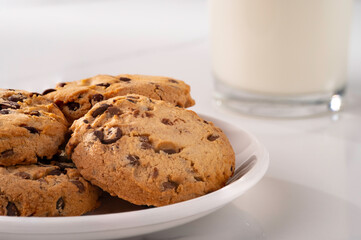 International Cookie Day. World Diabetes Day. National Real Sugar Day. World Heart Day. Breakfast with cookies and milk on the table