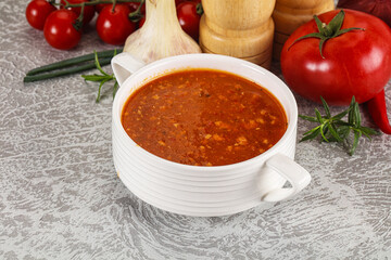 Hot tomato soup with diced chicken