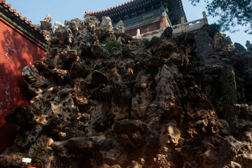 Artificial stone hill with the Imperial Prospect Pavilion standing on the top. It is located in Forbidden City Complex in Beijing, China.