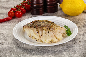 Baked cod fish fillet with spices