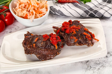 Baked beef cheeks with vegetables