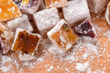 Sweet food Turkish delight, assorted rahat locum in form of cubes with nuts and powdered sugar, traditional food