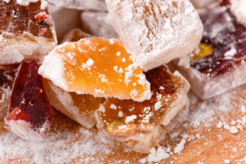 Sweet food Turkish delight, assorted rahat locum in form of cubes with nuts and powdered sugar, traditional food