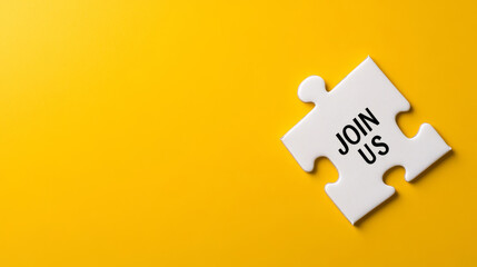 Isolated puzzle piece displaying join us text against vibrant yellow backdrop, symbolizing membership invitation and team connection