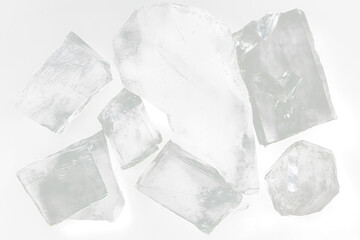 Collection of translucent, fractured, crystalline mineral specimens on Transparent Background .