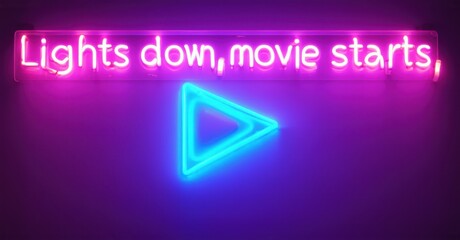 Lights Down Movie Starts neon sign glowing in pink with a large blue neon play button below, mounted on a dark wall, creating a cinematic and immersive atmosphere