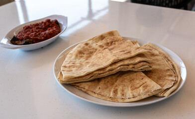 Traditional flatbread, lavash, wheaten pita flat bread or flatbread also known as pita bread