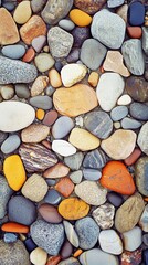 Colorful variety of smooth natural river stones in various shapes and sizes