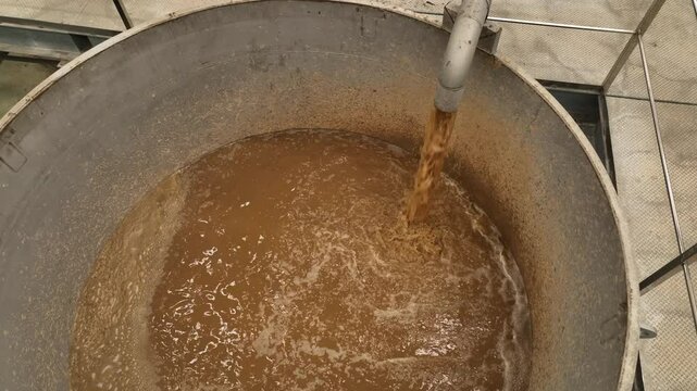 Oil Palm EFB Pulp and Paper: Close-up of Pulp Suspension in Industrial Tank