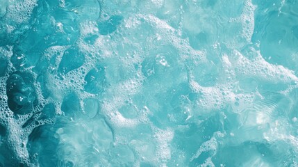 Obraz premium Transparent blue clear water surface texture with ripples, splashes and bubbles. Abstract summer banner background Water waves in sunlight with copy space Cosmetic moisturizer micellar toner emulsion