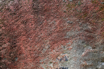 Background texture of wall with old worn pink stucco or cement